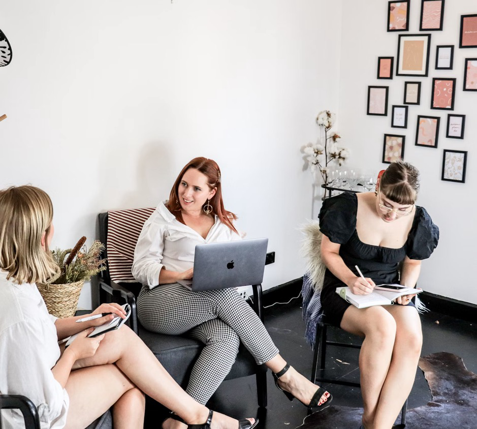 A group of marketing professionals brainstorming content ideas for SEO strategies.