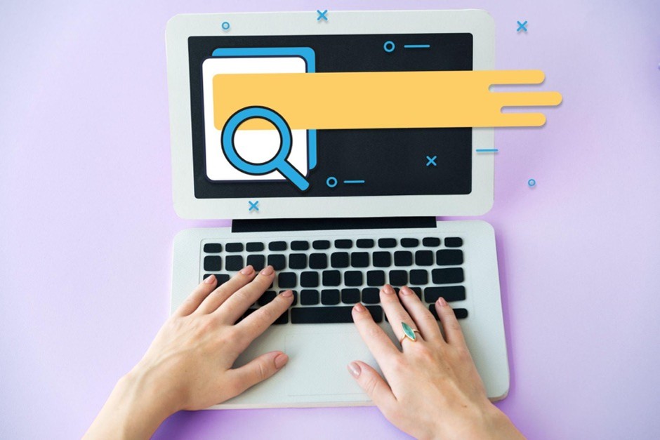 Hands resting on a laptop with a digital search icon and document overlay, representing the impact of AI content optimization on ranking signals.