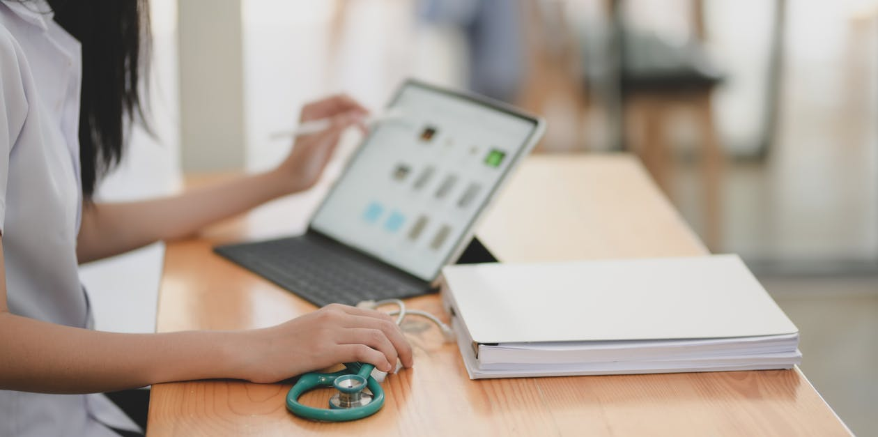 Doctor planning virtual medical appointment