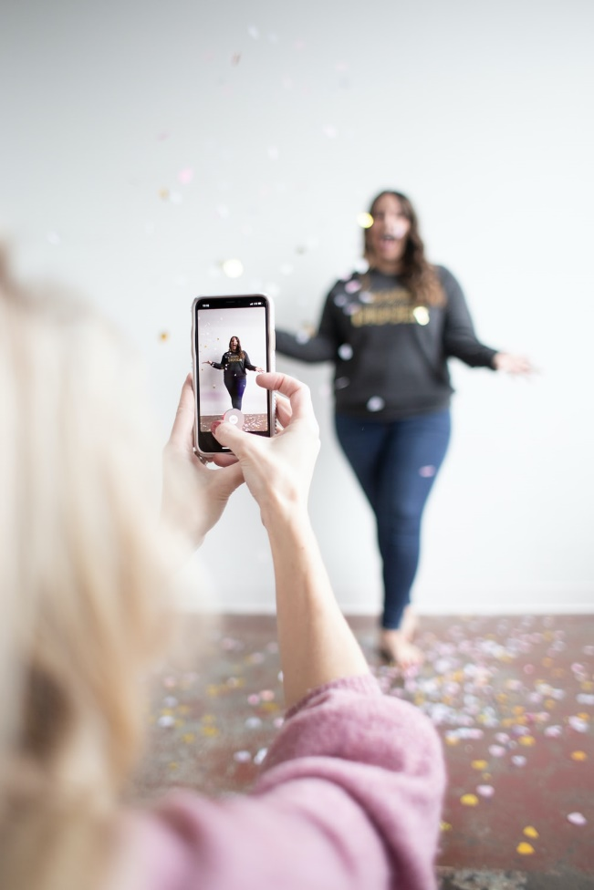 Two people shooting a TikTok video 